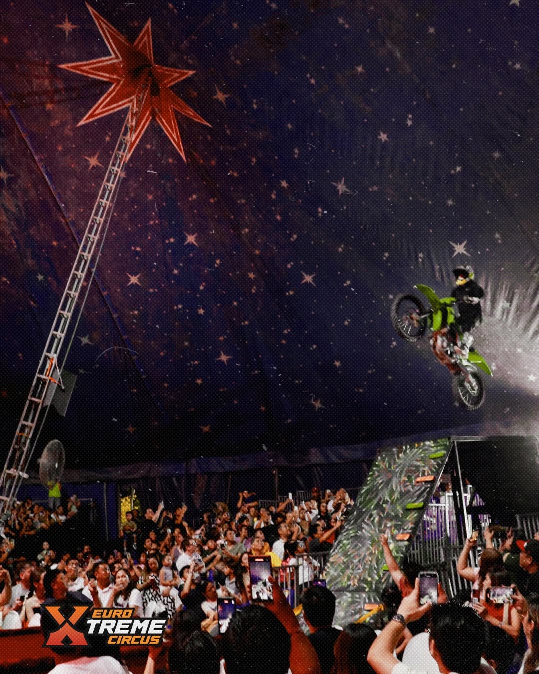 Euro Xtreme Circus FMX rider performing inside the big top